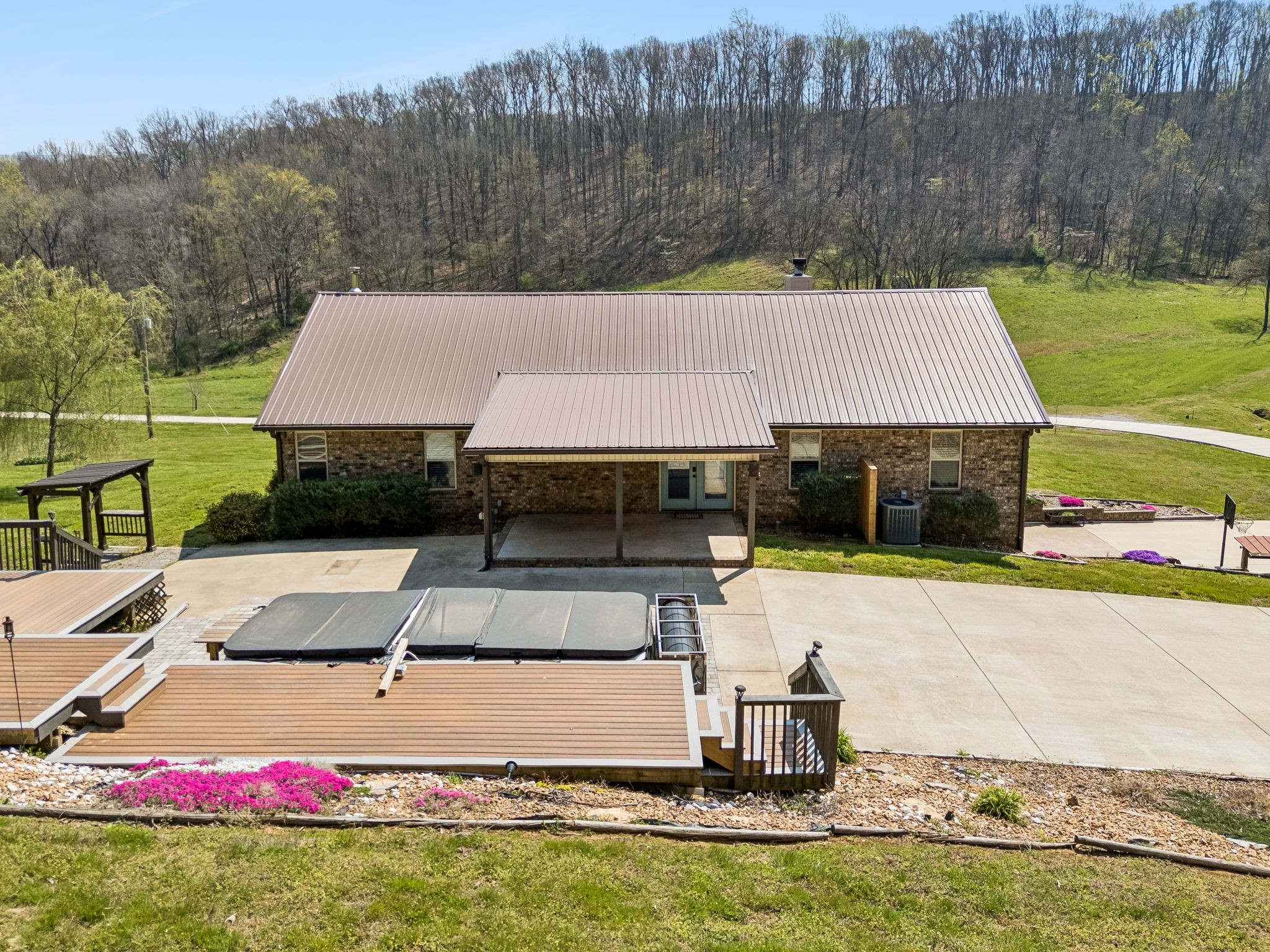 240 Scenic Drive Pulaski, TN 38478 - Photo 63 of 67 a aerial view of a house with swimming pool and a yard
