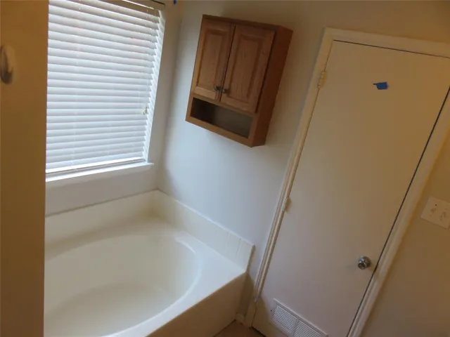 a bathroom with a tub