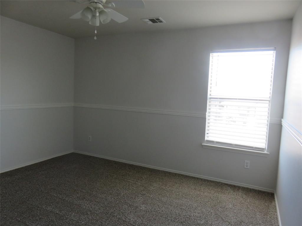 2026 Tanur Cascade Drive Anna, TX 75409 - Photo 21 of 24 an empty room with a window