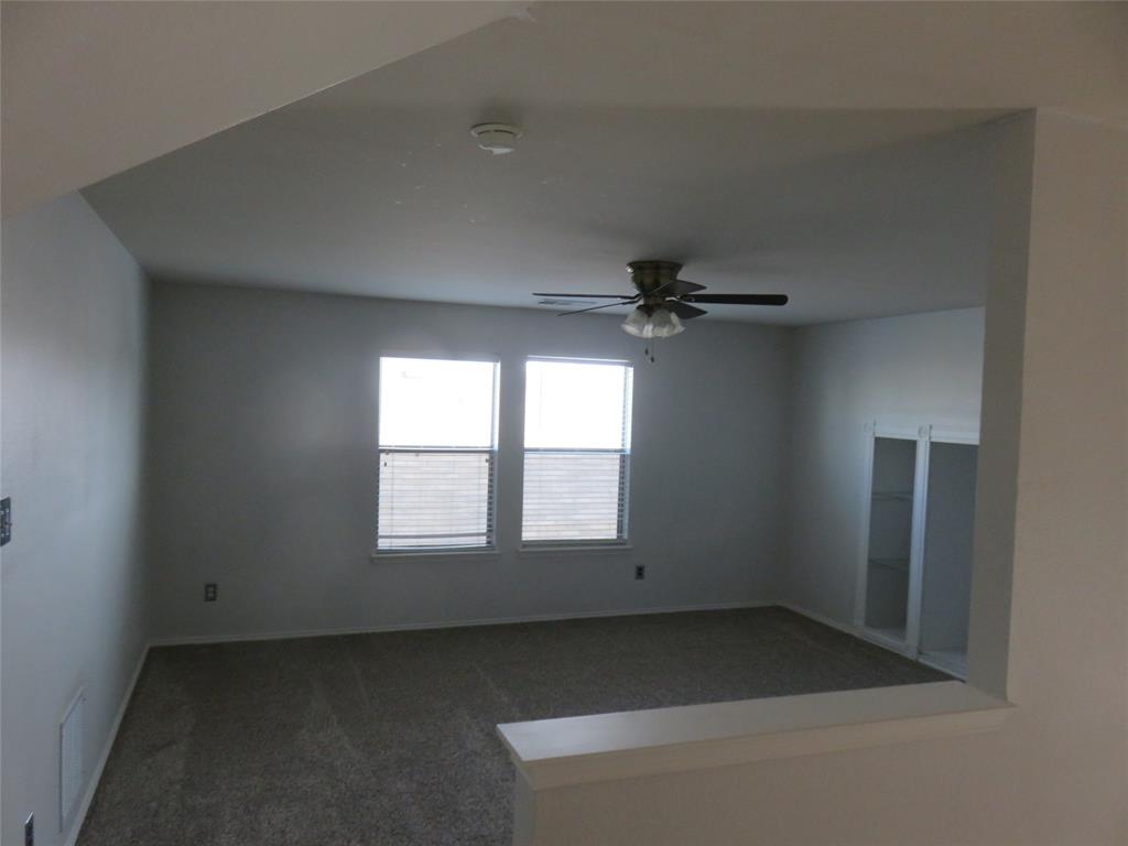 2026 Tanur Cascade Drive Anna, TX 75409 - Photo 23 of 24 an empty room with a window