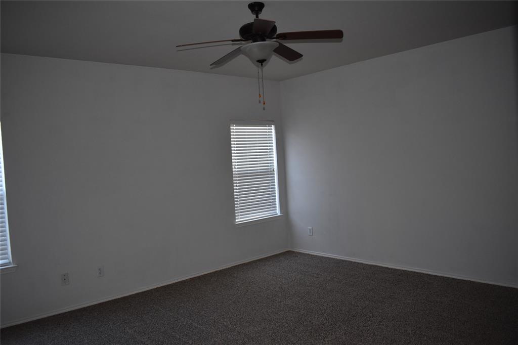 2026 Tanur Cascade Drive Anna, TX 75409 - Photo 8 of 24 a view of empty room with windows
