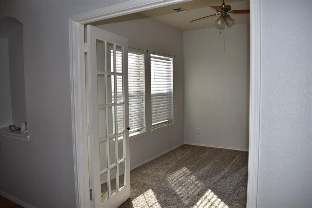 2026 Tanur Cascade Drive Anna, TX 75409 - Photo 10 of 24 a view of an empty room with a window