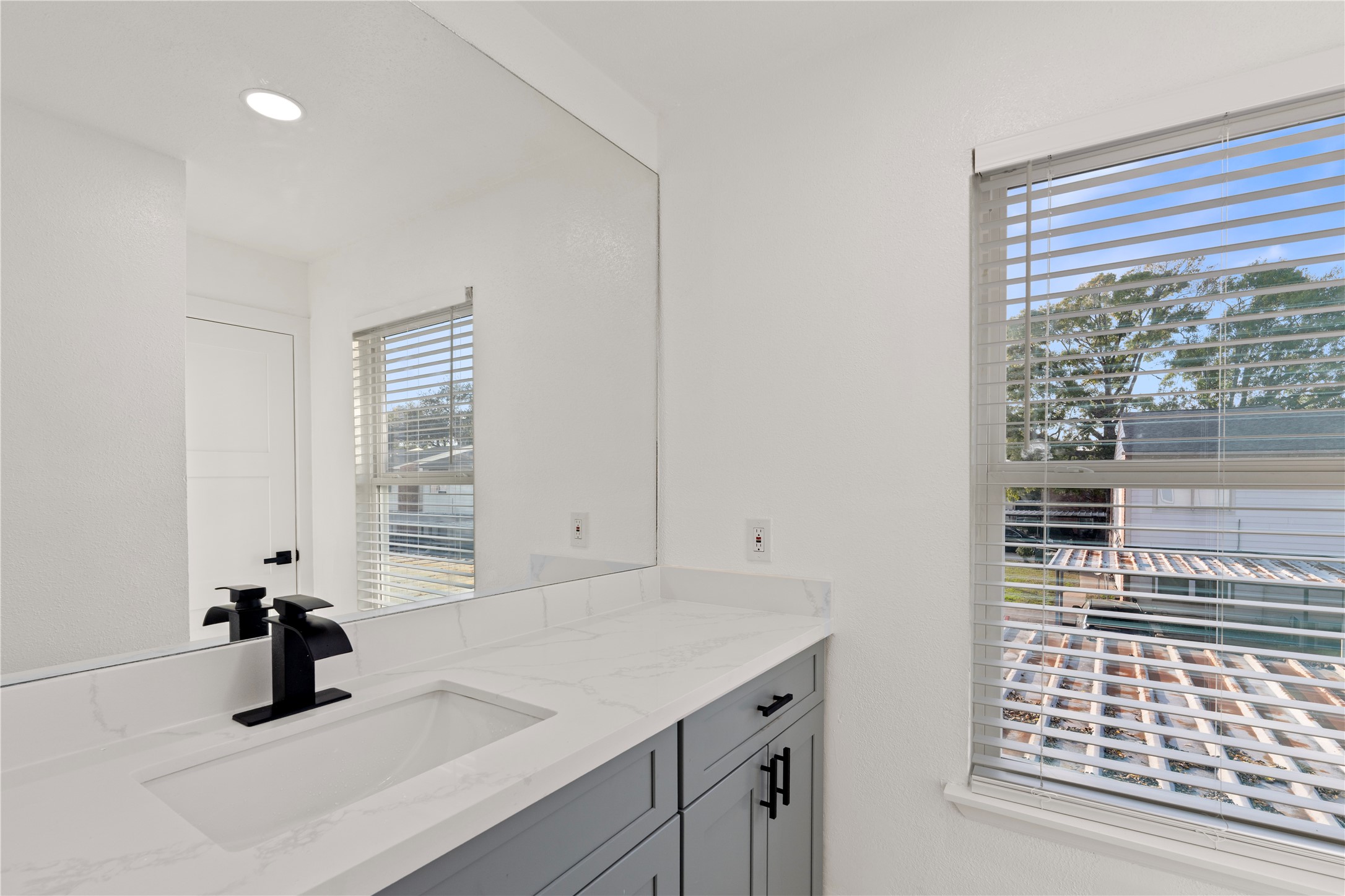 6001 Reims Road, Unit 1412 Houston, TX 77036 - Photo 12 of 28 a kitchen with a sink and a window