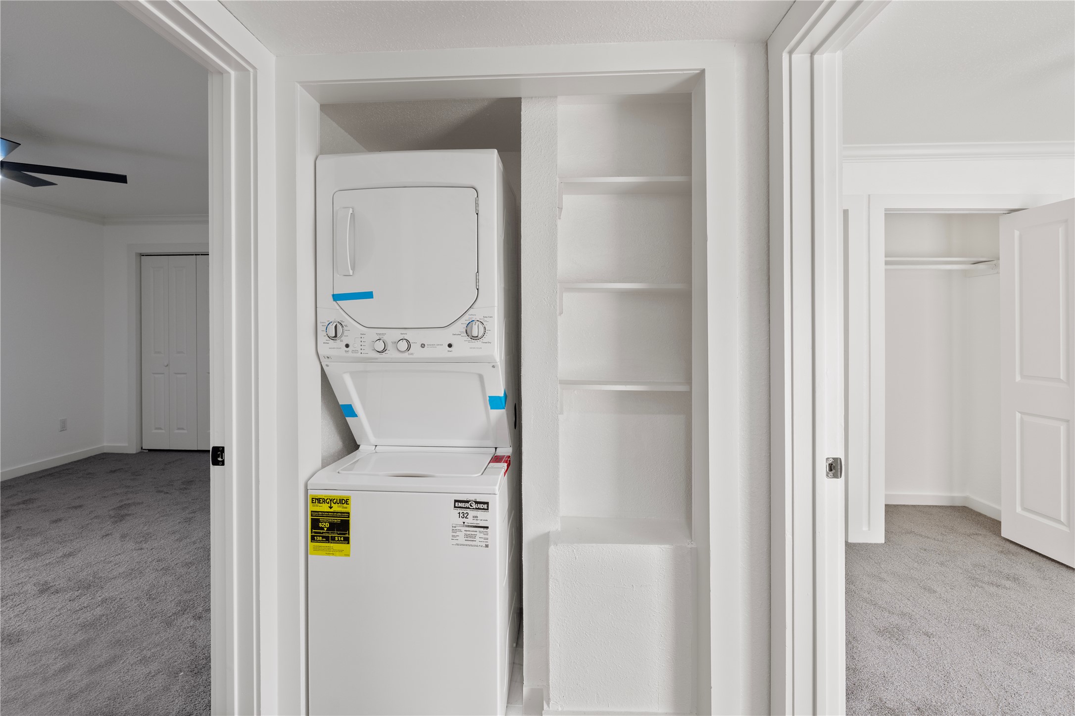 6001 Reims Road, Unit 1412 Houston, TX 77036 - Photo 15 of 28 a utility room with dryer and washer