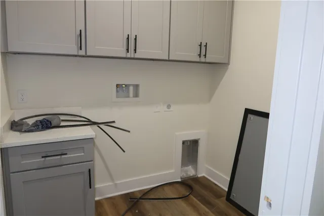 a view of storage and utility room with washer and dryer