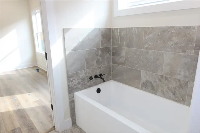 a bathroom with a bathtub