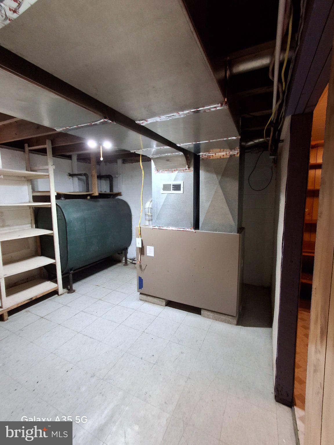 139 Cessna Hill Road Boswell, PA 15531 - Photo 16 of 34 Spacious basement with utility features.