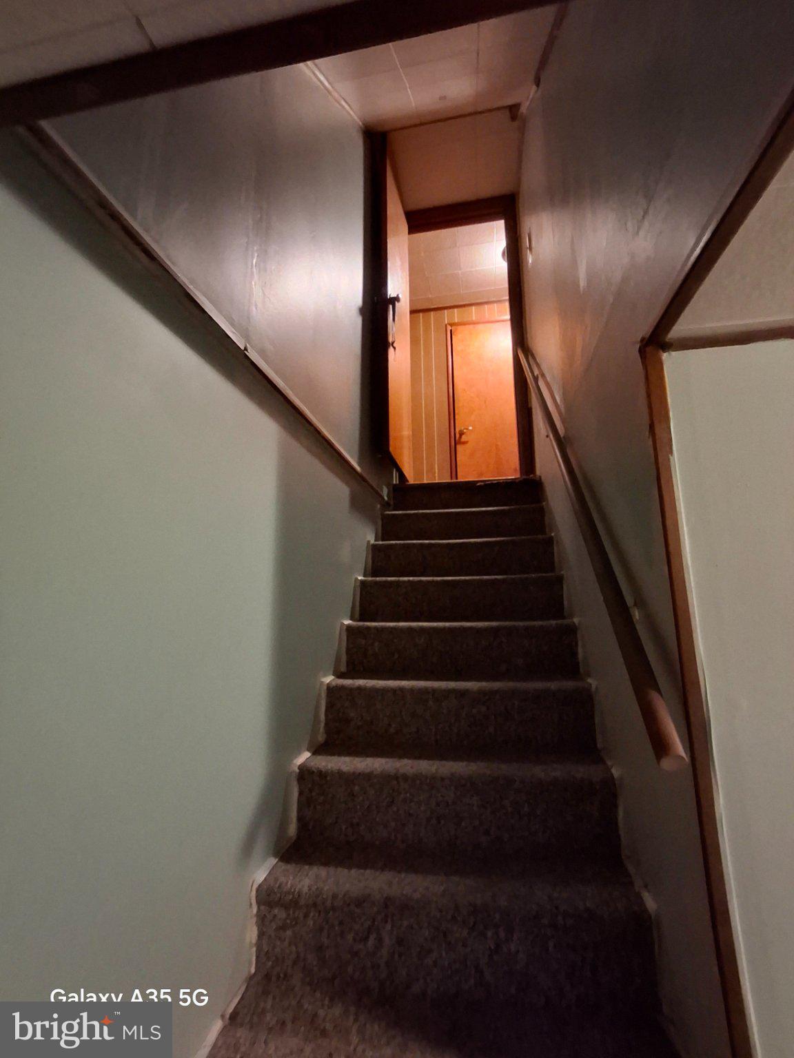 139 Cessna Hill Road Boswell, PA 15531 - Photo 26 of 34 Inviting staircase to hidden spaces.