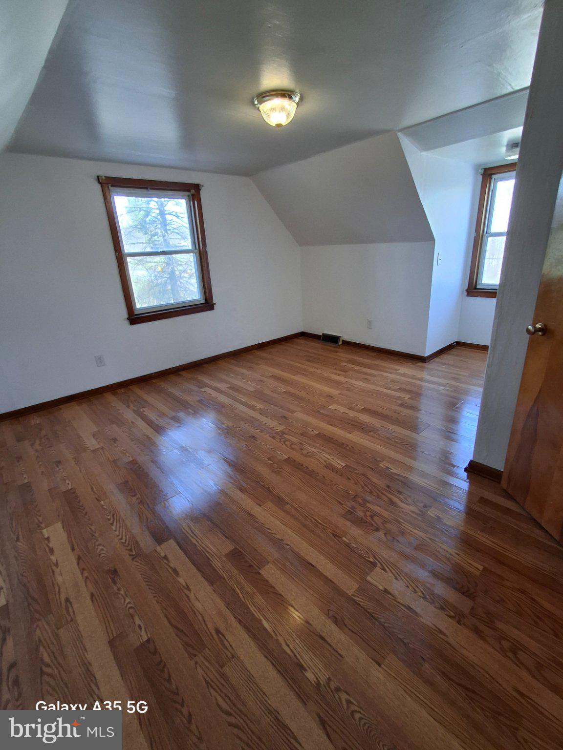139 Cessna Hill Road Boswell, PA 15531 - Photo 28 of 34 Bright, airy room with hardwood floors.