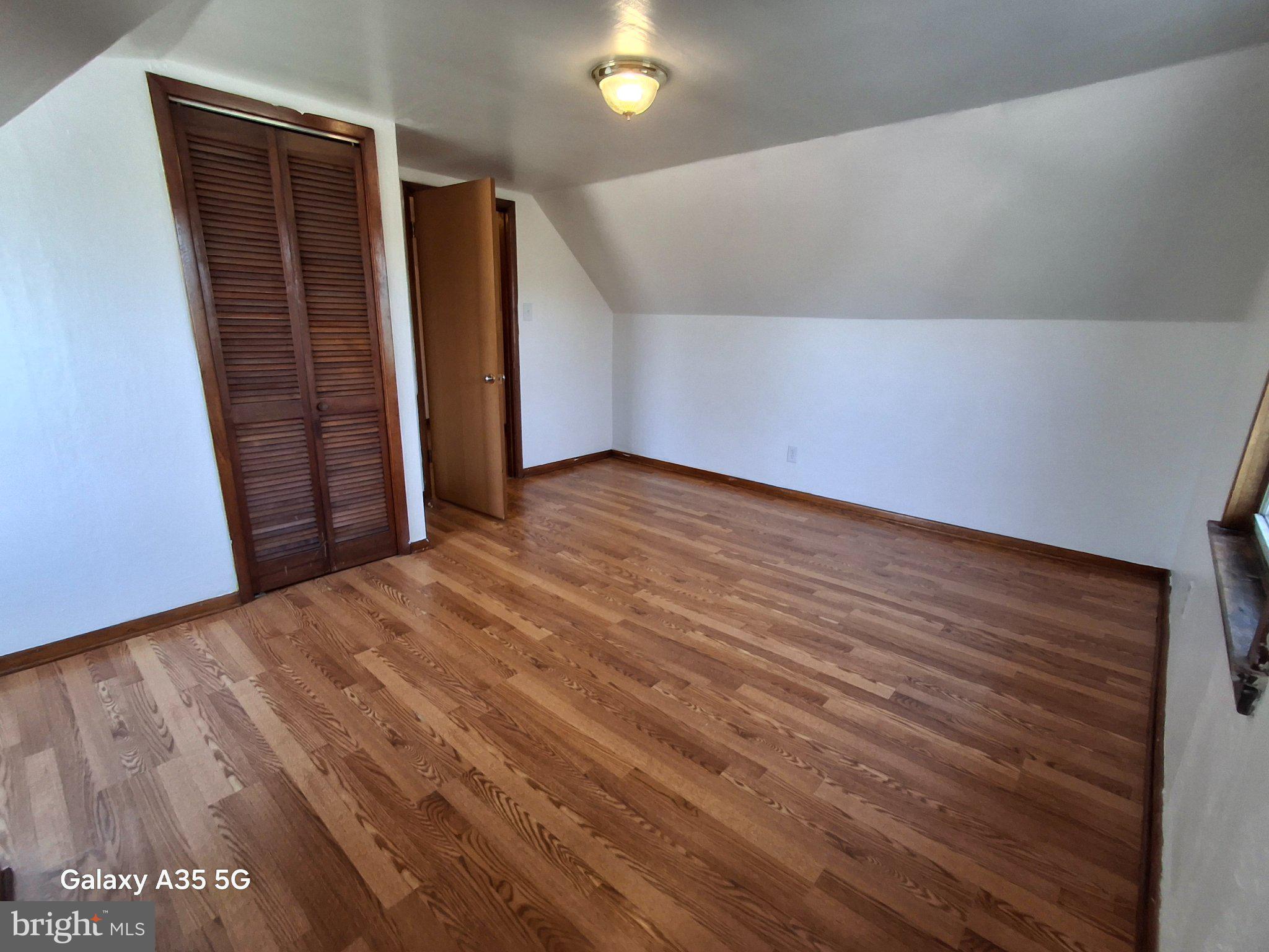 139 Cessna Hill Road Boswell, PA 15531 - Photo 29 of 34 Spacious room with warm wood floors.