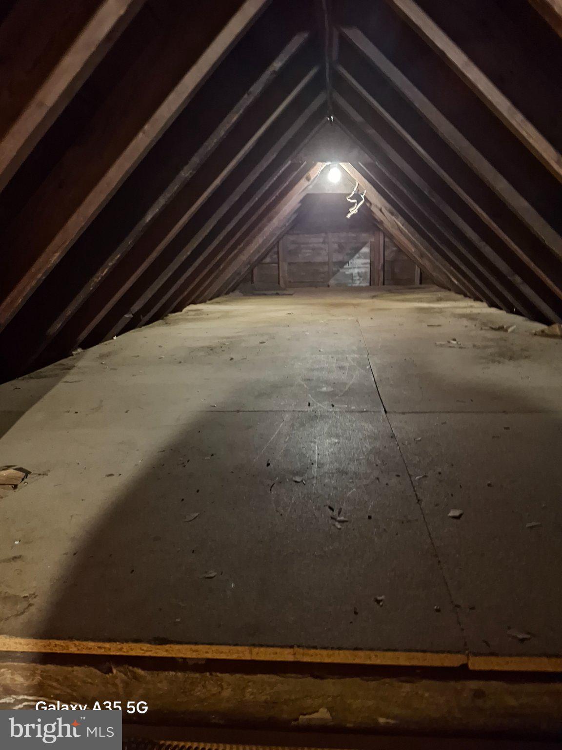 139 Cessna Hill Road Boswell, PA 15531 - Photo 34 of 34 Spacious attic with rustic beams.