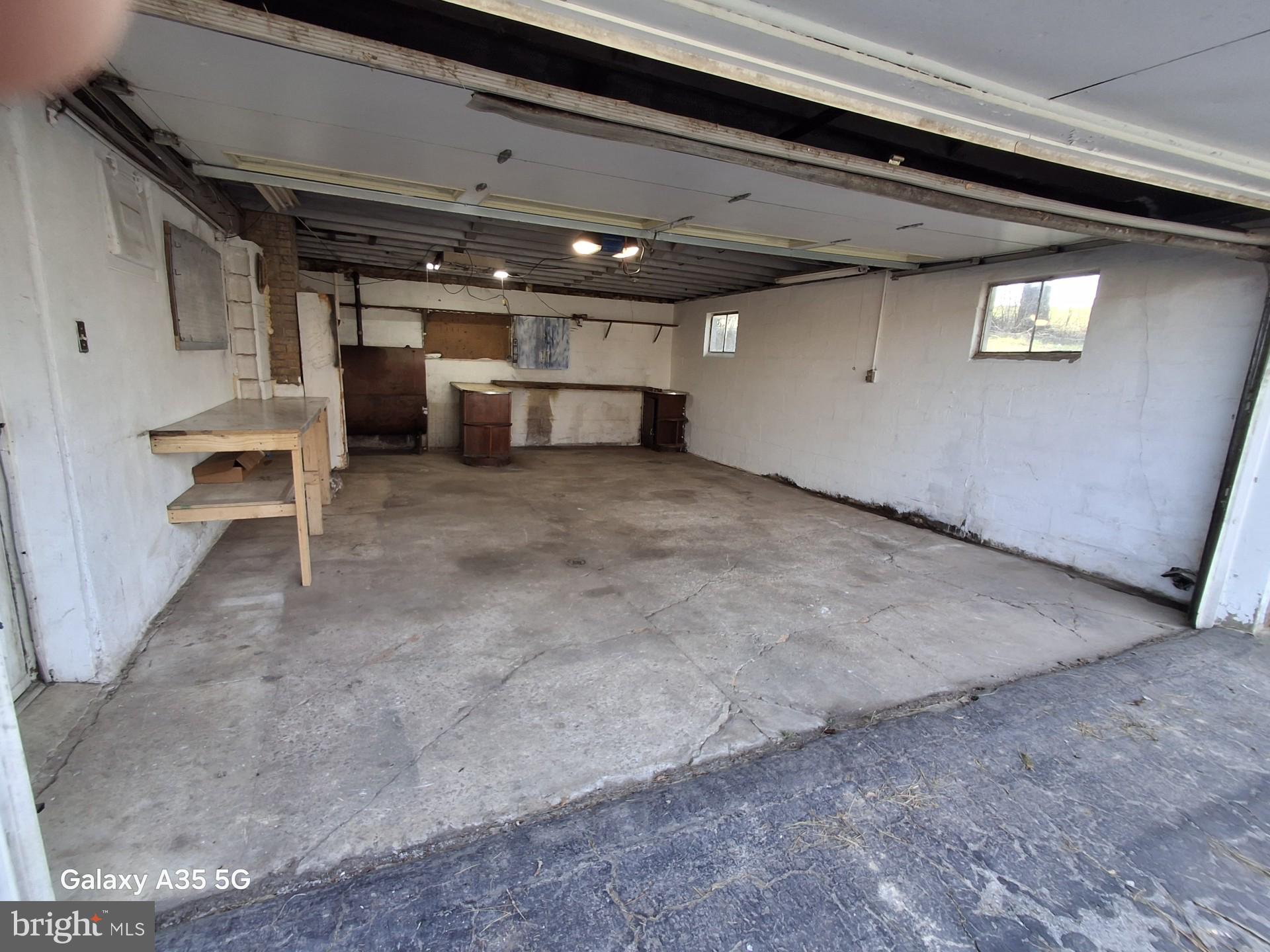 139 Cessna Hill Road Boswell, PA 15531 - Photo 8 of 34 Spacious garage with potential.