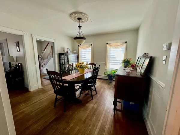 a view of a dining room with furniture