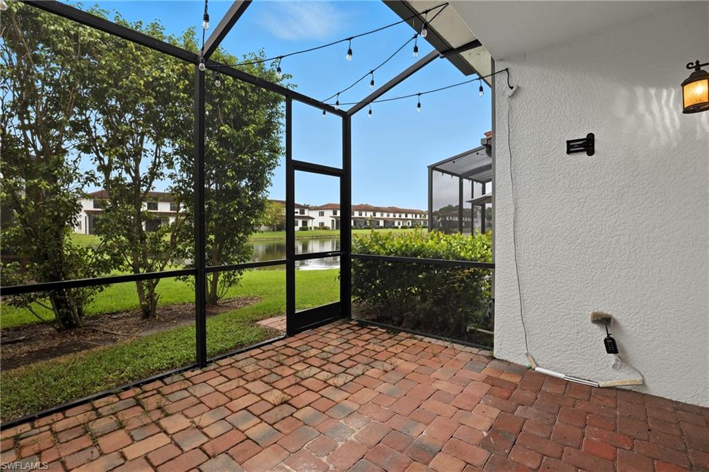 7894 Bristol Circle Naples, FL 34120 - Photo 11 of 29 a backyard of a house with lots of green space