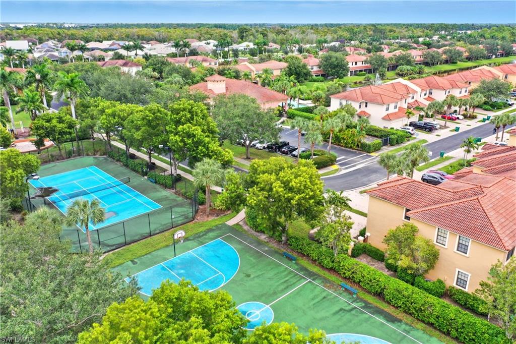 7894 Bristol Circle Naples, FL 34120 - Photo 27 of 29 an aerial view of residential houses with outdoor space and street view