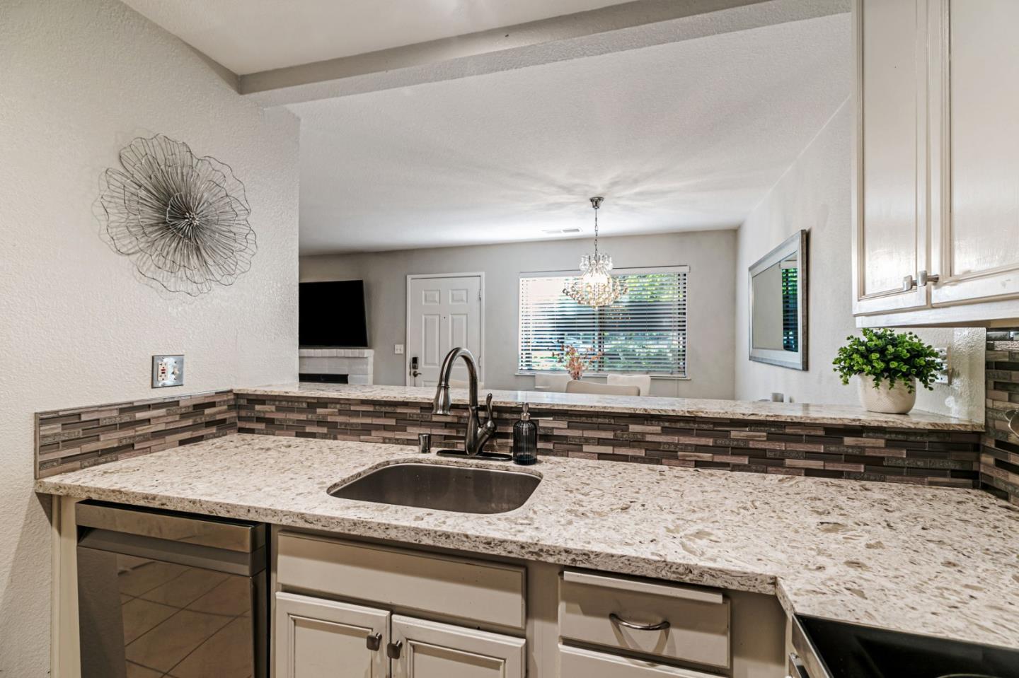 3400 La Terrace Circle San Jose, CA 95123 - Photo 13 of 39 a kitchen with a sink and a white cabinets