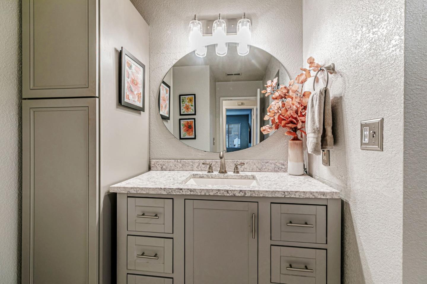 3400 La Terrace Circle San Jose, CA 95123 - Photo 18 of 39 a bathroom with a sink vanity and a mirror