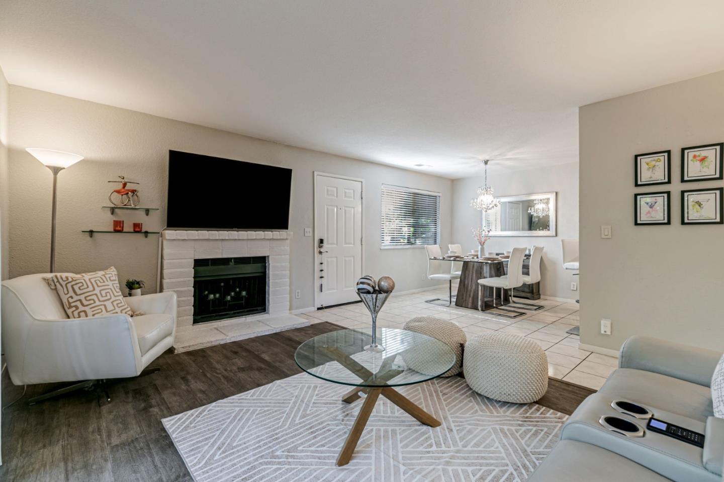 3400 La Terrace Circle San Jose, CA 95123 - Photo 3 of 39 a living room with furniture a fireplace and a flat screen tv