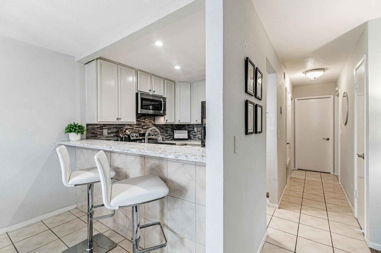 3400 La Terrace Circle San Jose, CA 95123 - Photo 8 of 39 a kitchen with stainless steel appliances a refrigerator and a stove top oven