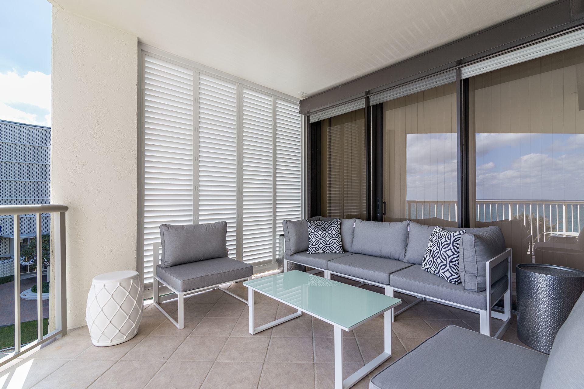 2770 South Ocean Boulevard, Unit 401S Palm Beach, FL 33480 - Photo 21 of 40 a living room with furniture and a window