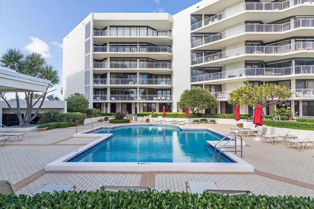 a view of pool with outdoor seating