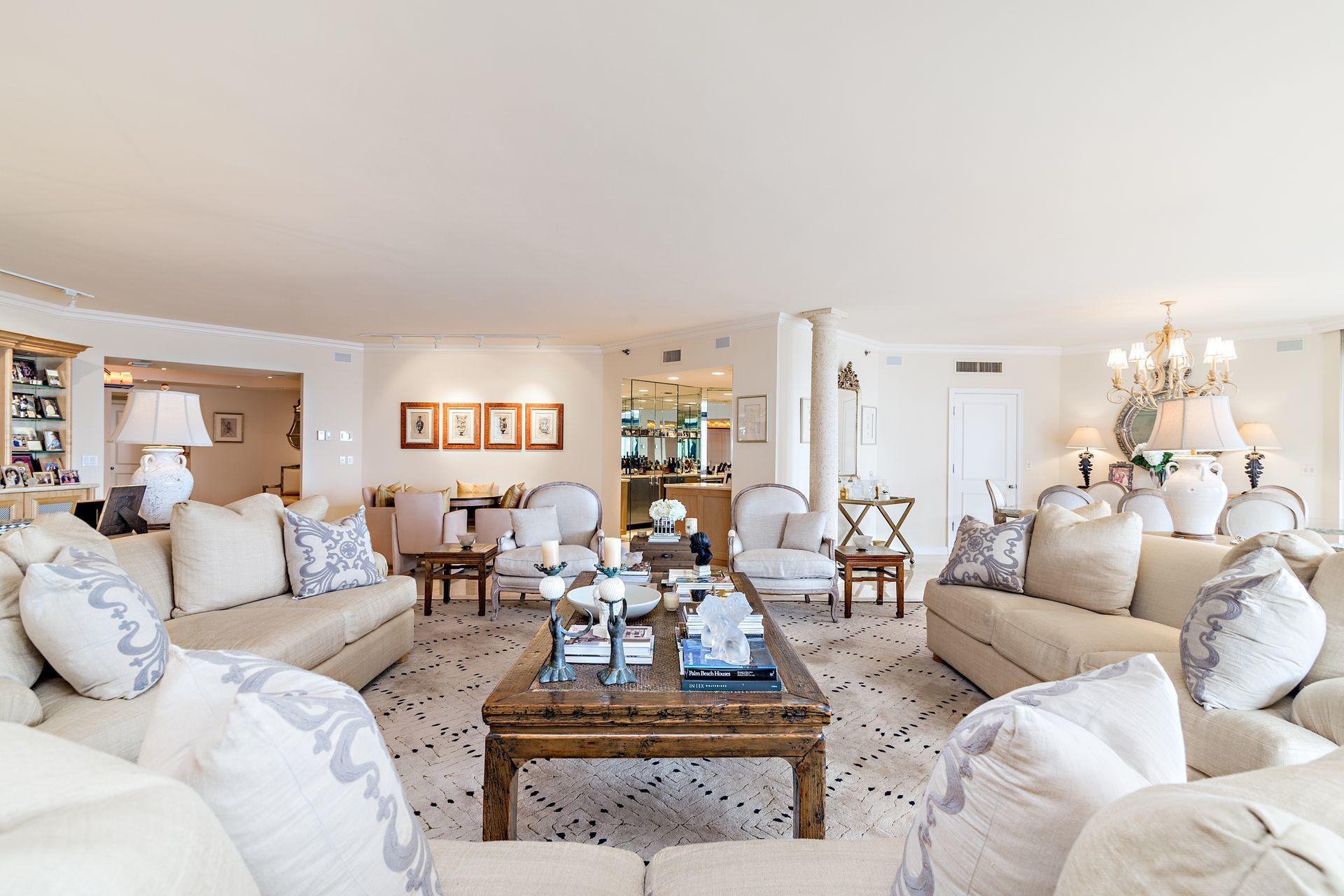 2770 South Ocean Boulevard, Unit 401S Palm Beach, FL 33480 - Photo 7 of 40 a living room with furniture and a large window