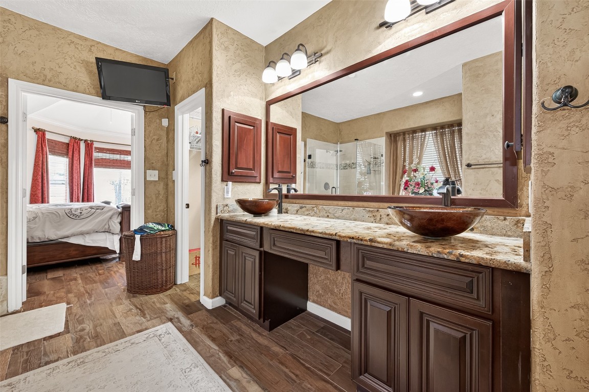 3506 Hunstanton Court Katy, TX 77450 - Photo 32 of 50 a kitchen with stainless steel appliances granite countertop a sink stove and refrigerator