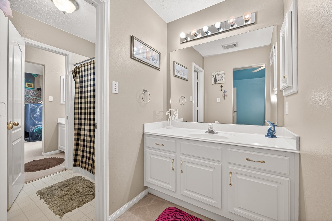3506 Hunstanton Court Katy, TX 77450 - Photo 39 of 50 a bathroom with a sink double vanity and a mirror