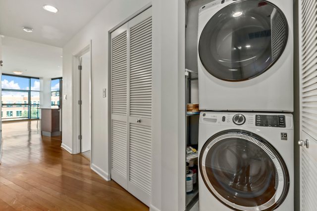 225 South Sangamon Street, Unit 412 Chicago, IL 60607 - Photo 22 of 29 a view of a hallway with washer and dryer