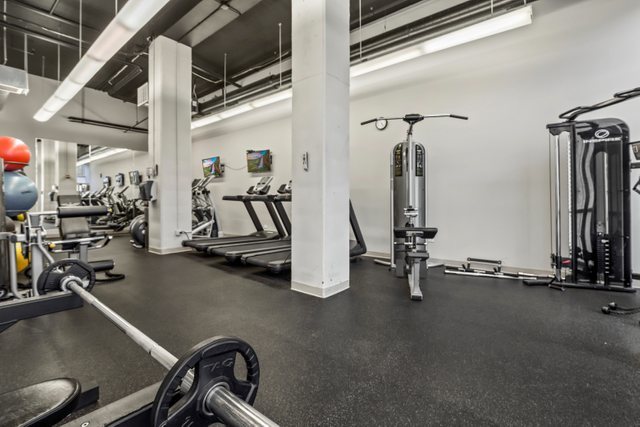 225 South Sangamon Street, Unit 412 Chicago, IL 60607 - Photo 24 of 29 a view of a room with gym equipment