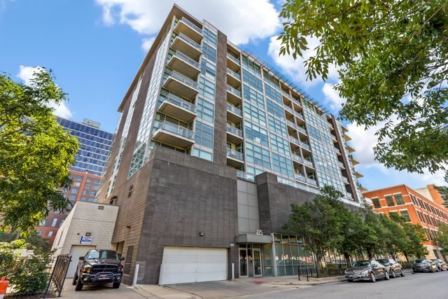 225 South Sangamon Street, Unit 412 Chicago, IL 60607 - Photo 28 of 29 a view of a tall building