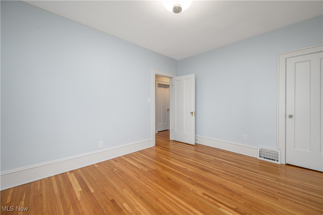 17728 Windward Road Cleveland, OH 44119 - Photo 24 of 32 Unfurnished bedroom featuring light wood-type flooring