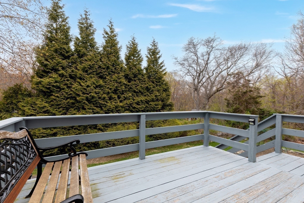 684 Country Way Scituate, MA 02066 - Photo 40 of 41 a view of outdoor space with seating yard and trees in the background