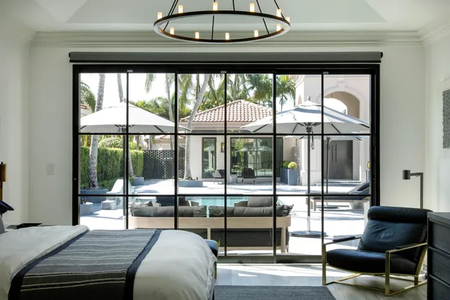 a room with furniture and a ceiling fan