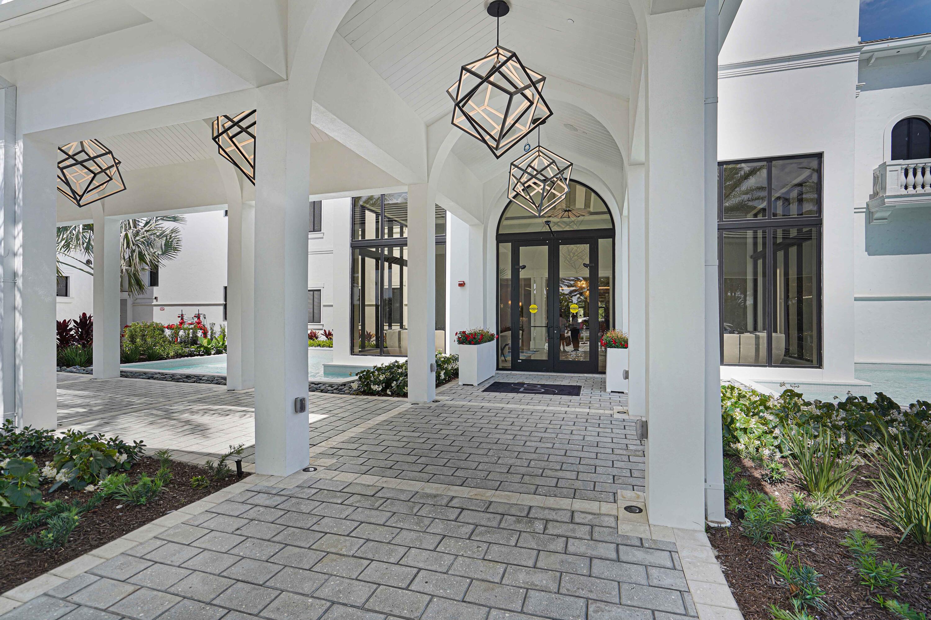 2555 Northwest 59th Street Boca Raton, FL 33496 - Photo 22 of 33 a view of a entryway door of the house