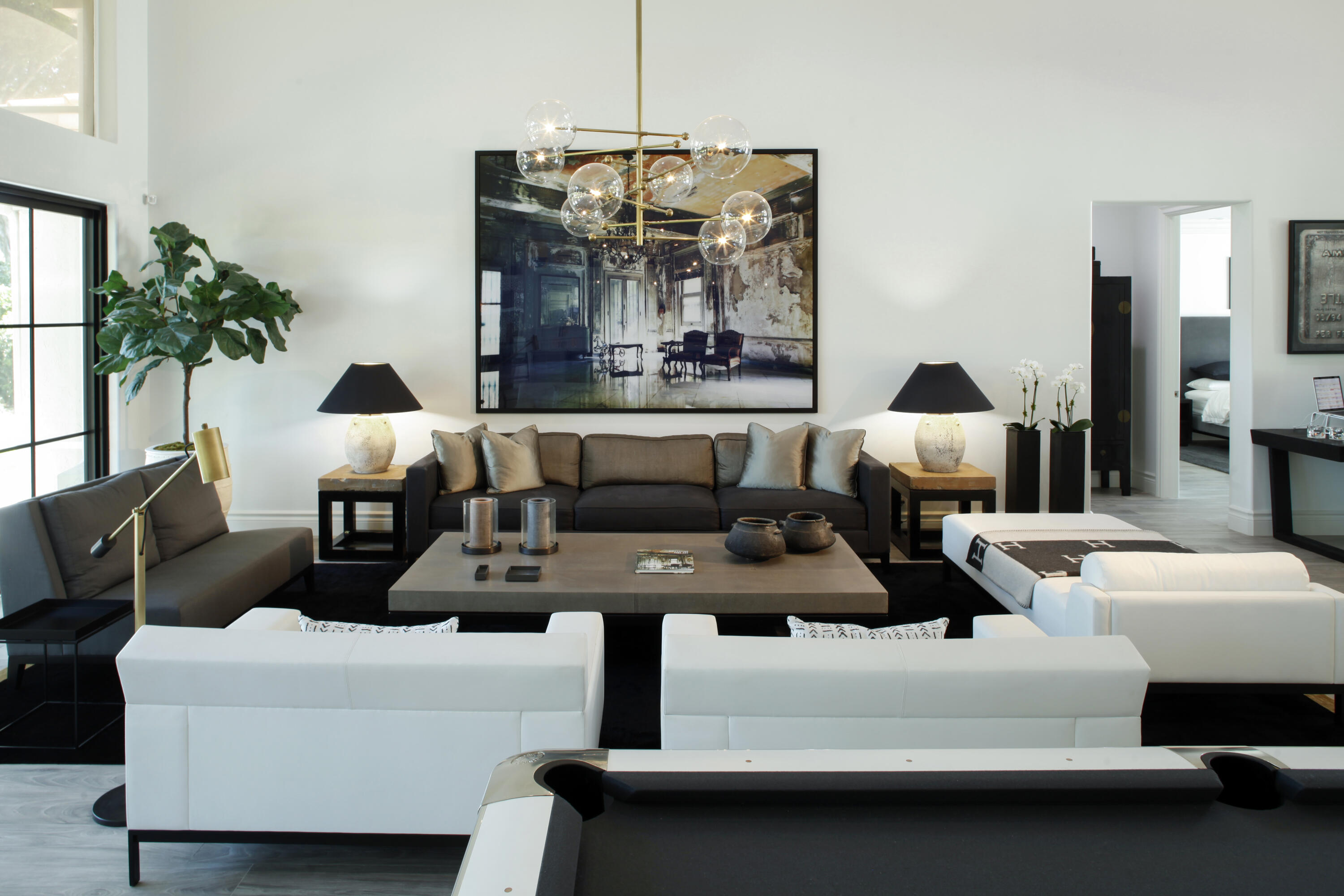 2555 Northwest 59th Street Boca Raton, FL 33496 - Photo 4 of 33 a living room with furniture and a chandelier