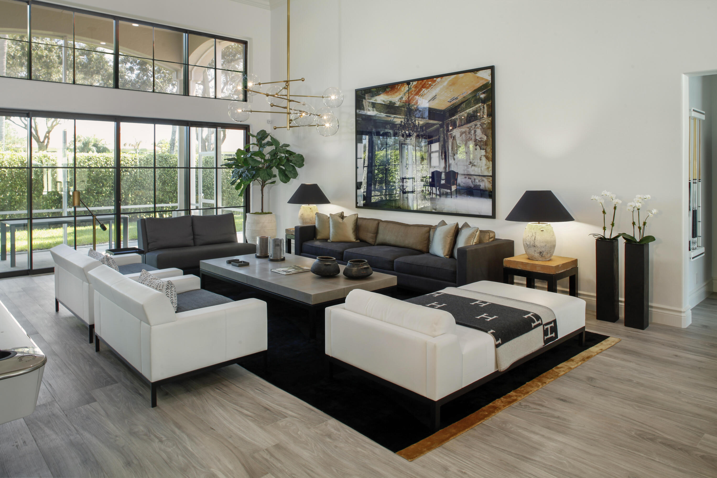 2555 Northwest 59th Street Boca Raton, FL 33496 - Photo 7 of 33 a living room with furniture and a large window