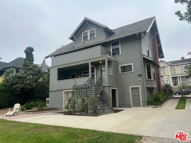 a front view of a house with a garage