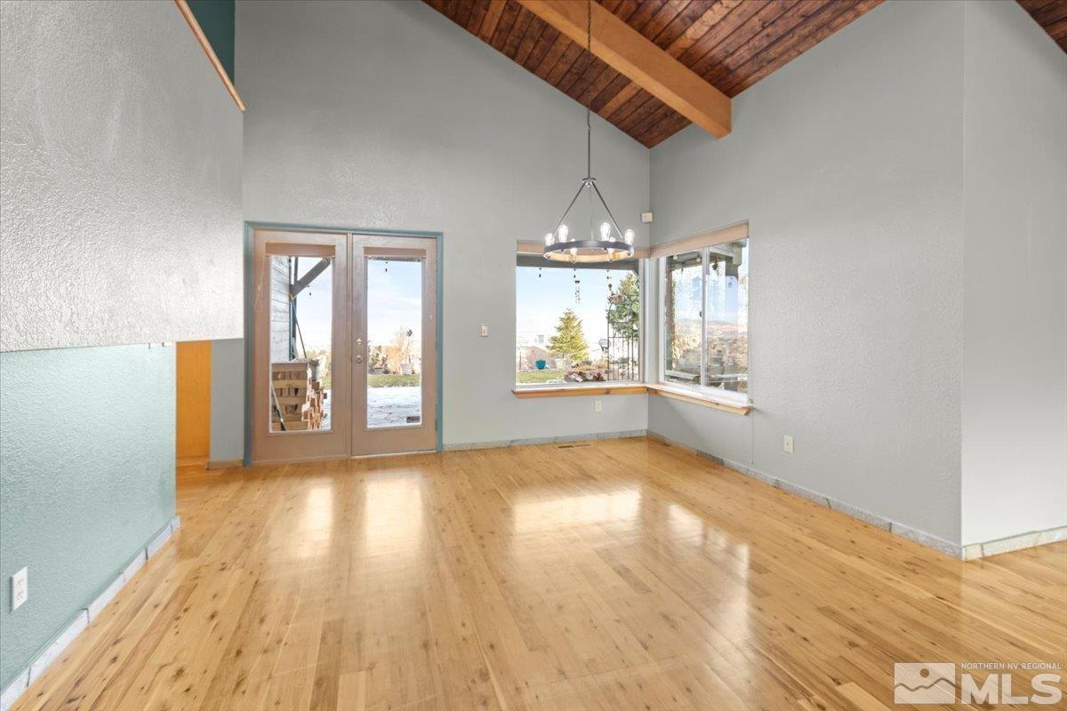 2616 Starr Meadows Loop Reno, NV 89519 - Photo 15 of 39 wooden floor in an empty room with a window