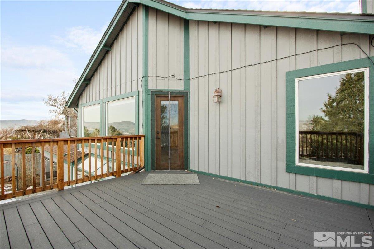 2616 Starr Meadows Loop Reno, NV 89519 - Photo 29 of 39 an entrance view with wooden floor and fence