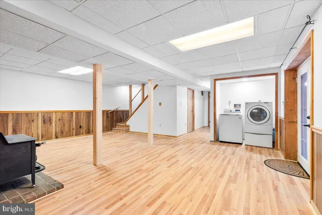 a view of room with wooden floor