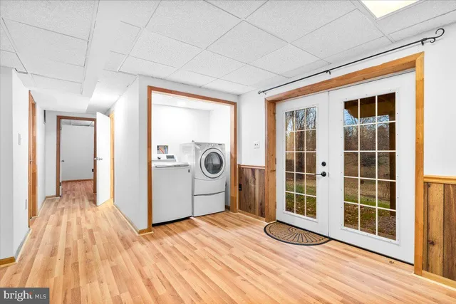 a view of balcony with wooden floor