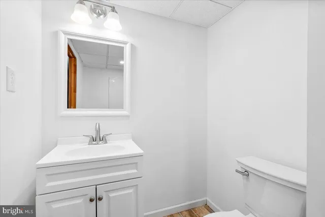 a view of a wooden deck with a yard