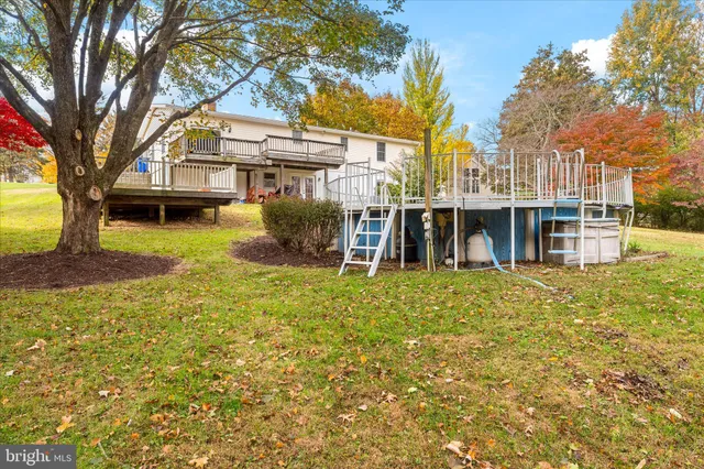 a front view of a house with swimming pool