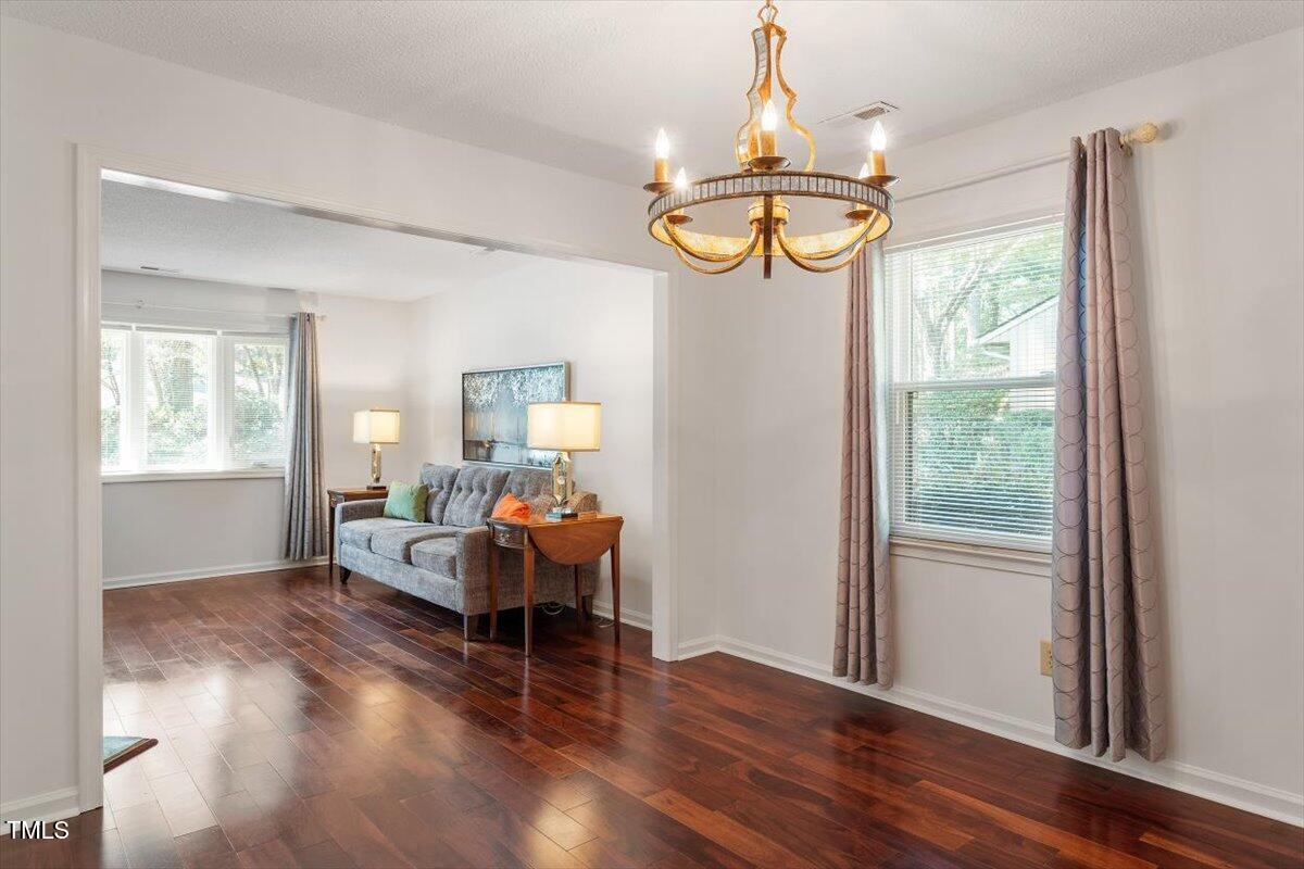 7911 Yester Court Raleigh, NC 27615 - Photo 9 of 33 Family Room open to Dining Room
