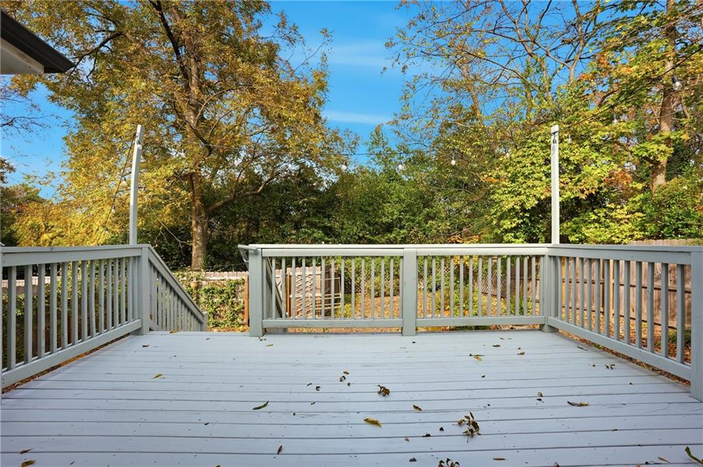 1025 Oak Street Southwest Atlanta, GA 30310 - Photo 24 of 30 a view of balcony with wooden floor and fence