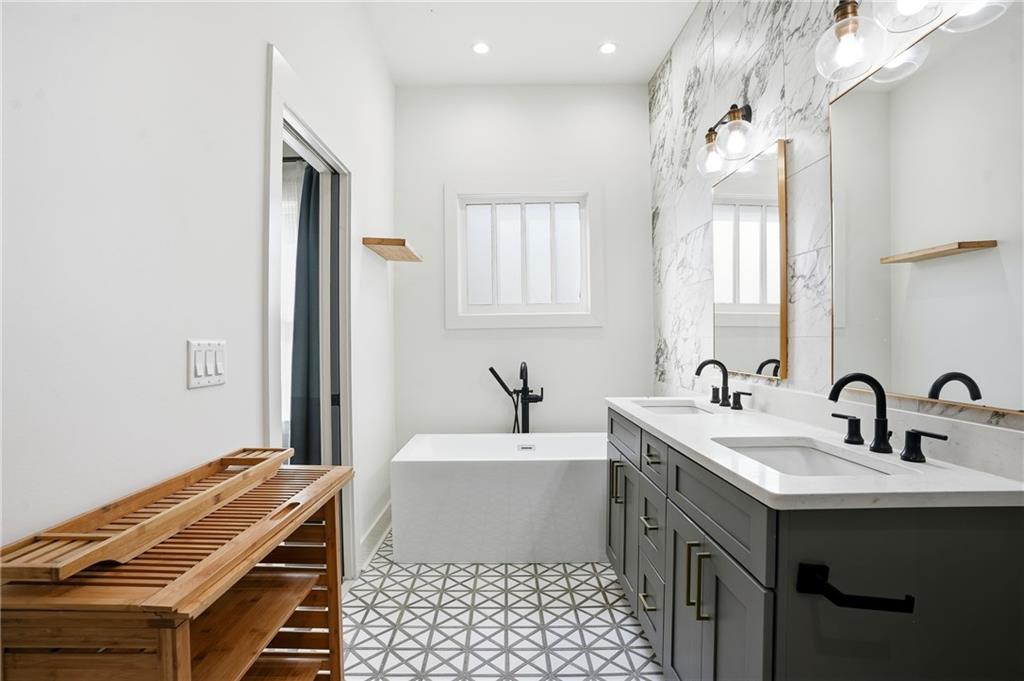 1025 Oak Street Southwest Atlanta, GA 30310 - Photo 4 of 30 a bathroom with a sink and a mirror