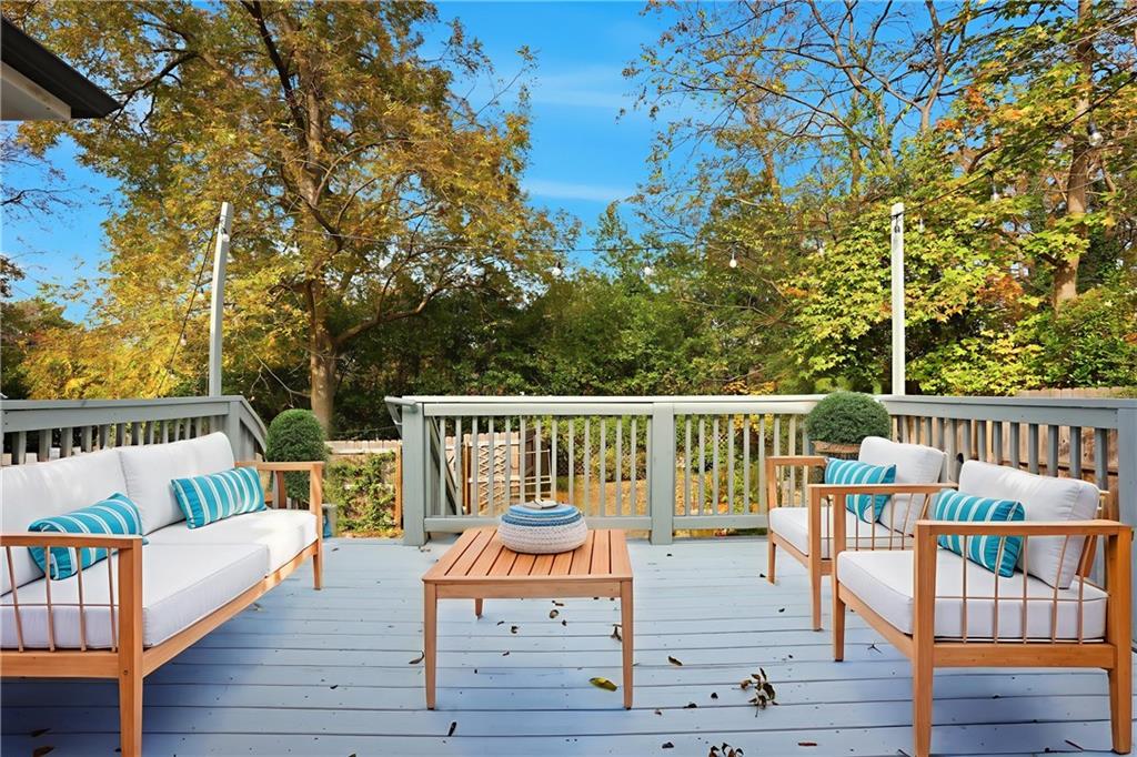 1025 Oak Street Southwest Atlanta, GA 30310 - Photo 5 of 30 a view of balcony with wooden floor and seating space