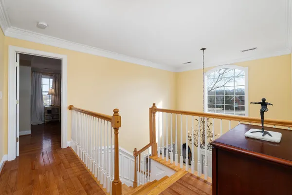 a bedroom with bed and window