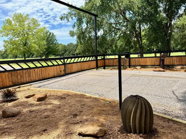 a view of swimming pool with outdoor seating